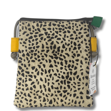 Small pouch with leopard print pattern on a white background