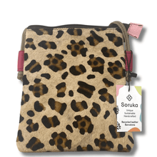 Leopard print bag with pink accents and a Soruka tag on a white background