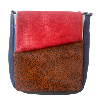 Multicolored leather bag with red, blue, and brown sections on a white background
