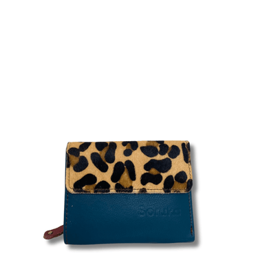 Blue wallet with leopard print flap on a white background