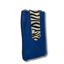 Blue pouch with zebra pattern strap on a white background