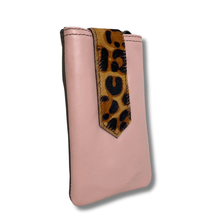 Pink phone case with leopard print accent on a white background
