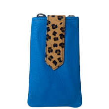 Blue pouch with a leopard print strap on a white background