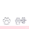 Silver paw print earrings on a white background