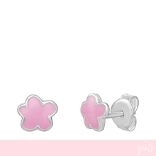 Pink flower-shaped earrings with silver posts on a white background