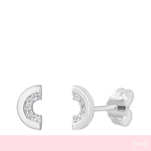 Silver earrings with small diamonds on a white background