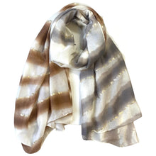 Striped scarf with brown, white, and gray pattern on a white background
