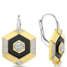 Gold and silver earrings with black and diamond accents on a white background