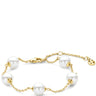 A delicate gold chain bracelet featuring five large white freshwater pearls spaced evenly along the chain, with a lobster clasp and extender chain on a clean white background.