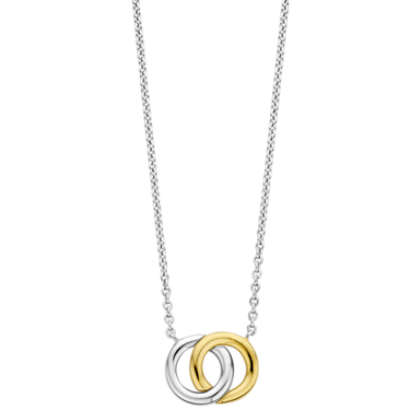 Necklace with interlocking rings in gold and silver on a white background