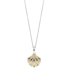 Shell-shaped pendant on a chain against a white background