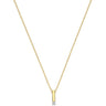 A delicate gold chain necklace featuring a vertical bar pendant with a small clear gemstone at the bottom, displayed against a solid white background.