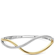 A two-tone infinity-style bangle bracelet featuring a polished yellow gold outer loop and a silver-toned inner loop paved with small clear stones, shown on a plain white background.