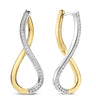 A pair of infinity-shaped hoop earrings in yellow gold and white gold, with pavé-set clear stones along the white gold sections, shown on a plain white background.