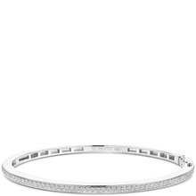 Silver bracelet with small stones on a white background