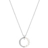 A silver necklace featuring a crescent moon pendant adorned with small white pearls and a pavé-set clear stone, shown against a plain white background.
