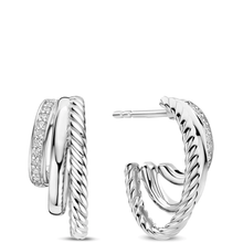 Silver hoop earrings with a textured design on a white background