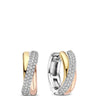 Pair of gold and silver hoop earrings on a white background