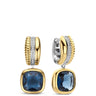 A pair of gold and silver hoop earrings with a large blue cushion-cut gemstone dangling below, shown on a clean white background.