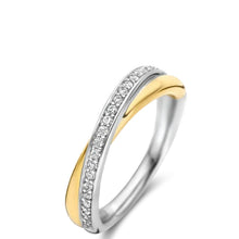 A two-tone twist band ring featuring a silver-colored metal base paved with small clear stones, accented by a curved gold-colored band, shown on a white background.