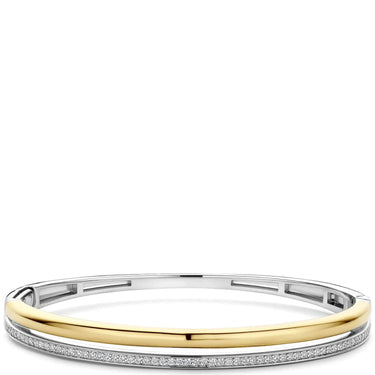 Two-tone gold and silver bracelet with small diamonds on a white background