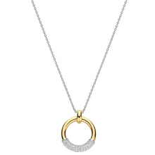 A delicate silver chain necklace featuring a pendant with a polished gold half-circle and a pavé-set diamond half-circle, shown on a solid white background.