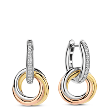 ladies silver hoop earrings with three tone metal circle disc