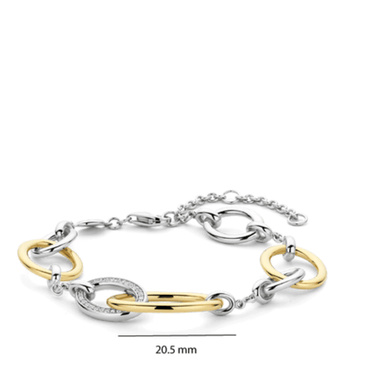 Two-tone gold and silver bracelet on a white background