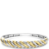 Two-tone silver and gold bracelet on a white background