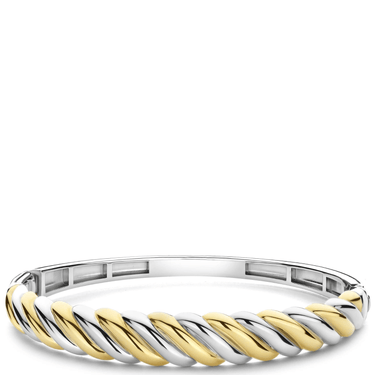 Two-tone silver and gold bracelet on a white background