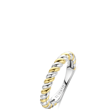 Two-tone silver and gold ring on a white background