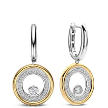 A pair of gold and silver drop earrings with circular designs, featuring clear pavé-set round stones and a central single round stone, shown on a plain white background.