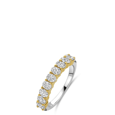 Two-tone gold and silver ring with diamonds on a white background