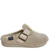 A single beige sherpa fleece clog slipper with a wide strap and a gold-tone buckle, shown from a side profile on a white background. A brand label for 'Kate Perry Slippers' is visible inside the shoe.