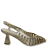 Gold high-heeled shoe with intricate design on a white background