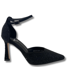 Black studded high-heeled shoe on a white background