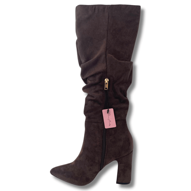 Brown knee-high boot with a pink tag on a white background