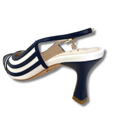 Navy and white striped shoe on a white background