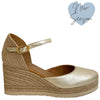 unisa-caceres-gold-leather-wedge-shoes