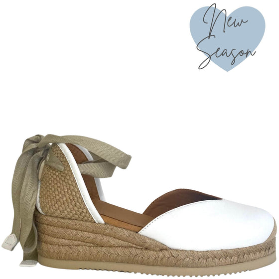 unisa-carlys-white-leather-wrap-around-ankle-strap-wedge-shoes