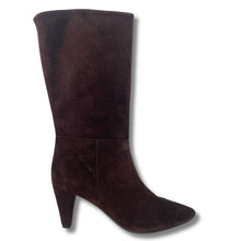 A dark brown suede knee-high boot with a pointed toe and a mid-height block heel, shown from a side profile on a white background.