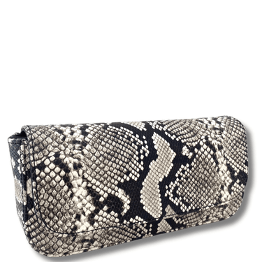 Clutch bag with snake print pattern on a white background