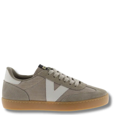 Sneaker with a white 'V' logo on a white background