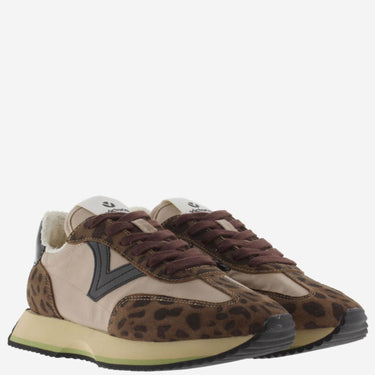 Pair of brown and beige sneakers with leopard print pattern on a white background