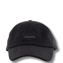 Black cap with 'Victoria' embroidery on a white background