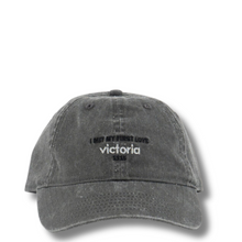grey cap with text on a white background