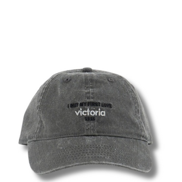 grey cap with text on a white background