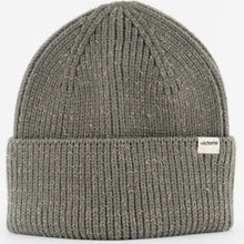 Gray knit beanie with a brand label on a white background