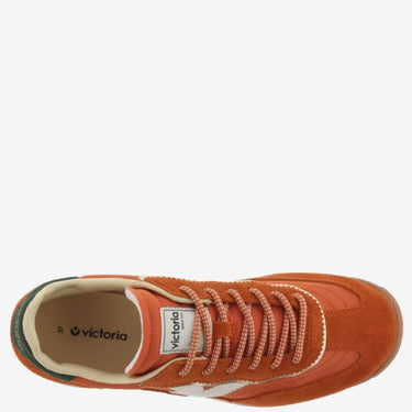 Orange sneaker with 'Victoria' branding on a white background