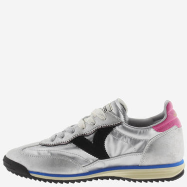 Silver sneaker with pink and blue accents on a white background